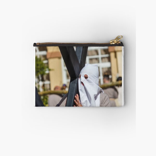 Item preview, Hooded Penitent Carrying Large Cross During Holy Week Religious Procession in Town Square designed and sold by Nmallia.