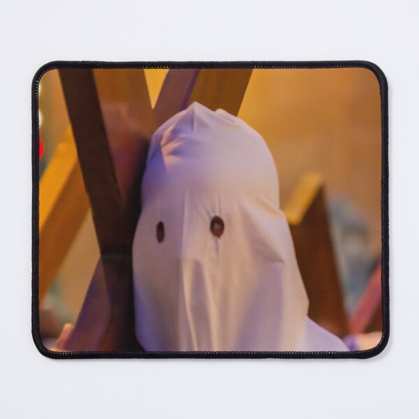 Item preview, Hooded Penitent Carrying Large Cross During Holy Week Religious Procession in Town Square designed and sold by Nmallia.