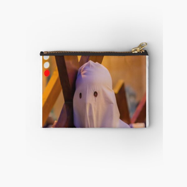 Item preview, Hooded Penitent Carrying Large Cross During Holy Week Religious Procession in Town Square designed and sold by Nmallia.