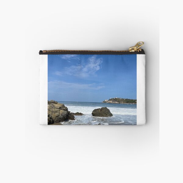 Item preview, Idyllic sandy beach with large rocks and blue sky designed and sold by Art of Momenz.