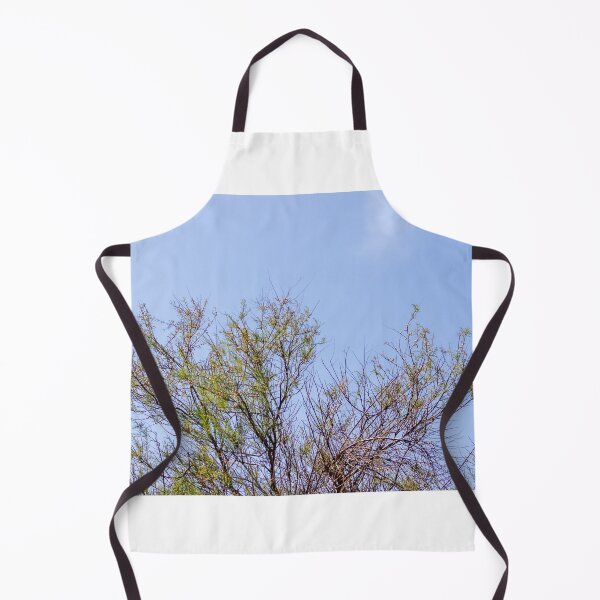 Item preview, Sunlit Tree Branches Reaching Into A Clear Blue Sky Over Open Landscape designed and sold by Nmallia.