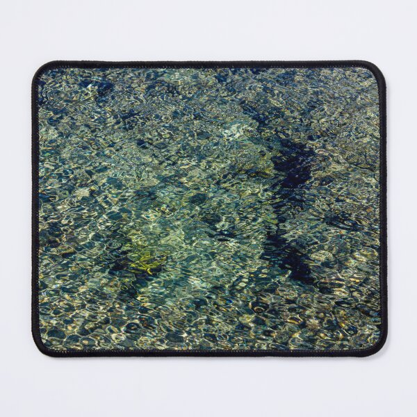 Item preview, Clear Shallow Sea Water With Sunlit Ripples Over Pebble Seabed Creating Abstract Texture designed and sold by Nmallia.