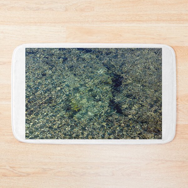 Item preview, Clear Shallow Sea Water With Sunlit Ripples Over Pebble Seabed Creating Abstract Texture designed and sold by Nmallia.