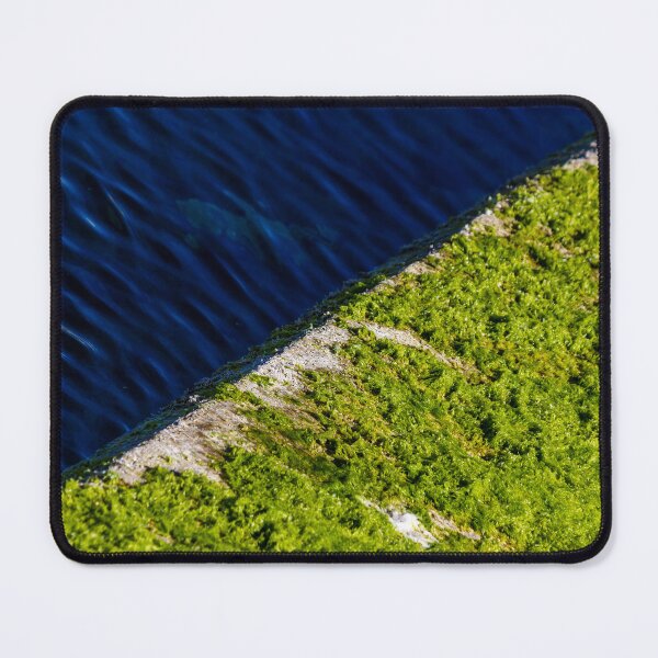 Item preview, Moss Covered Concrete Edge Beside Deep Blue Rippling Water With Vivid Green Algae designed and sold by Nmallia.