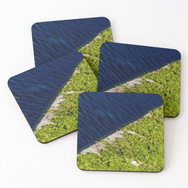 Item preview, Moss Covered Concrete Edge Beside Deep Blue Rippling Water With Vivid Green Algae designed and sold by Nmallia.