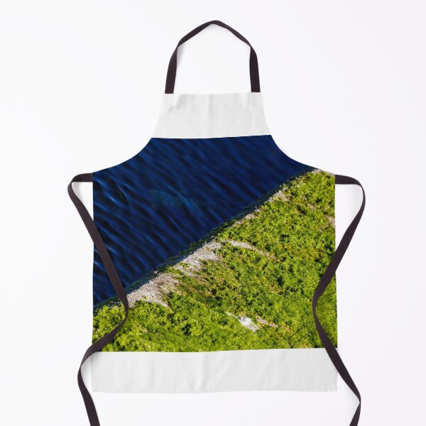 Item preview, Moss Covered Concrete Edge Beside Deep Blue Rippling Water With Vivid Green Algae designed and sold by Nmallia.