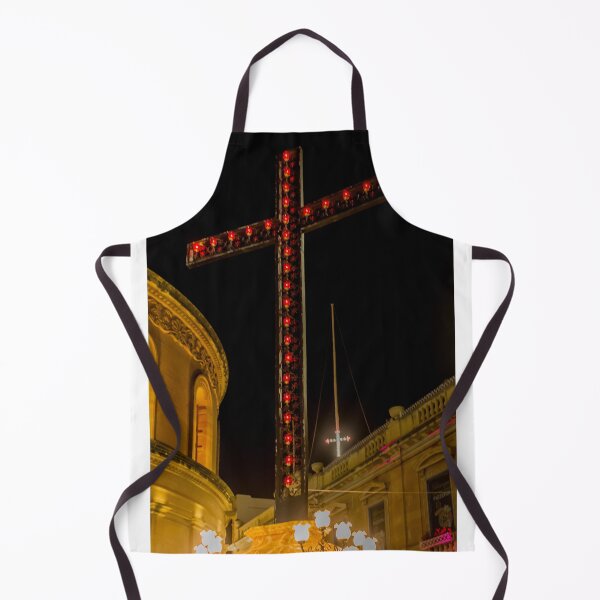 Item preview, Illuminated Red Light Cross At Night Above Historic Church Buildings And Street Lamps designed and sold by Nmallia.