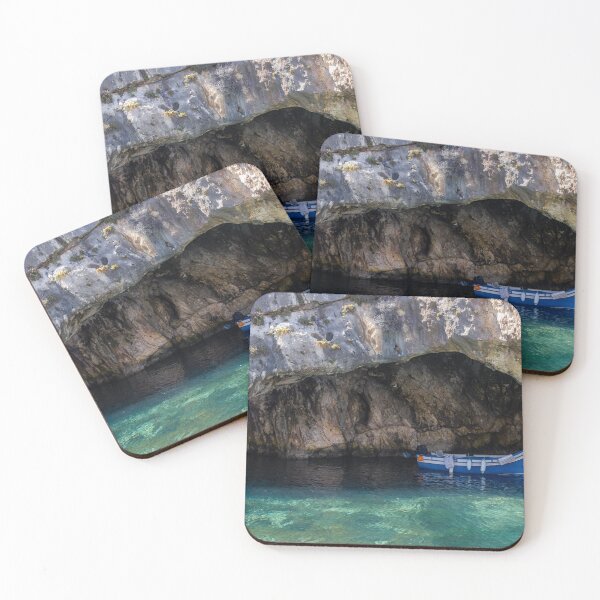 Item preview, Sunlit Blue Fishing Boat Sheltered in Rocky Sea Cave With Crystal Clear Turquoise Water designed and sold by Nmallia.