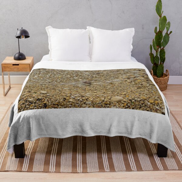 Item preview, Pebble Beach Shoreline With Clear Shallow Water, Gentle Wave Foam And Sunlit Stones designed and sold by Nmallia.