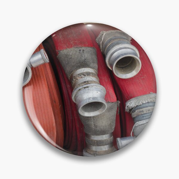 Item preview, Stacked Red Fire Hoses With Metal Couplings On A Fire Truck Shelf For Firefighting Readiness designed and sold by Nmallia.