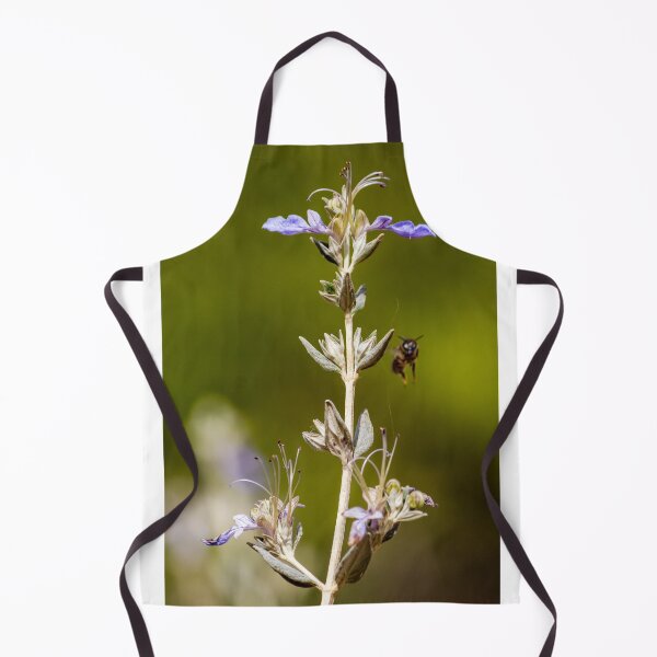 Item preview, Macro Shot Of Purple Wildflower With Bee In Flight On Soft Green Background designed and sold by Nmallia.