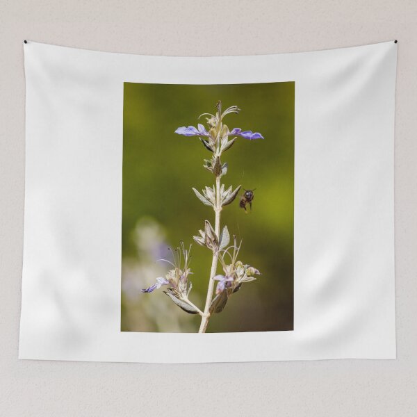 Item preview, Macro Shot Of Purple Wildflower With Bee In Flight On Soft Green Background designed and sold by Nmallia.
