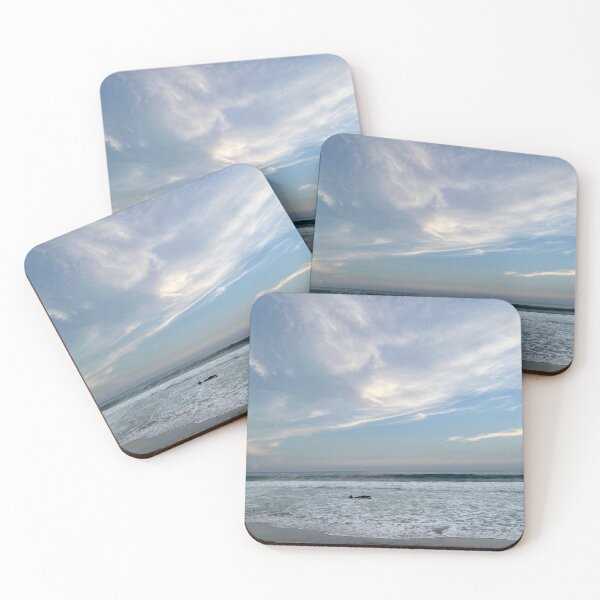 Item preview, Spectacular pastel sky over a vast ocean and dark beach designed and sold by Art of Momenz.