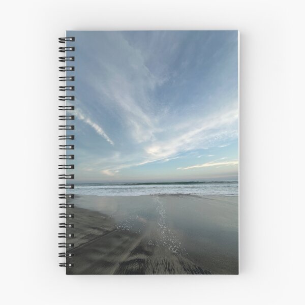 Item preview, A vast ocean with subtle beach reflections beneath a wide cloudy sky. designed and sold by Art of Momenz.