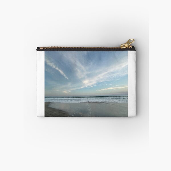 Item preview, A vast ocean with subtle beach reflections beneath a wide cloudy sky. designed and sold by Art of Momenz.