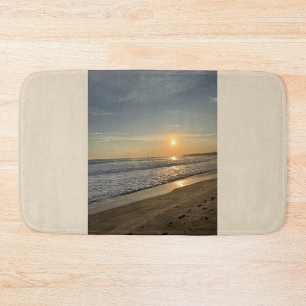Item preview, Golden sunset over the ocean with luminous waves on the beach designed and sold by Art of Momenz.