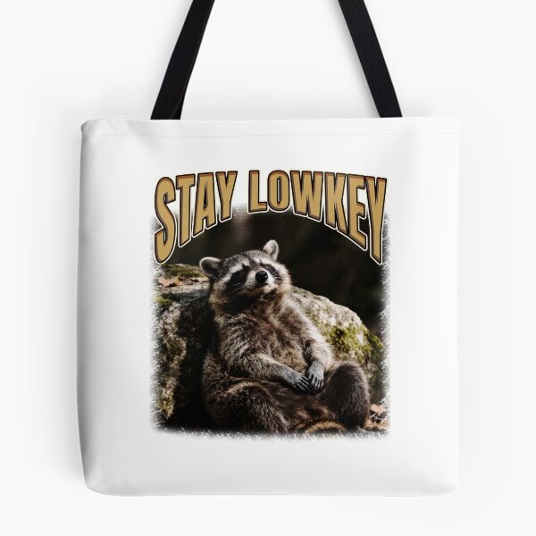Item preview, Stay Lowkey Chill Raccoon Saying designed and sold by bngfx.