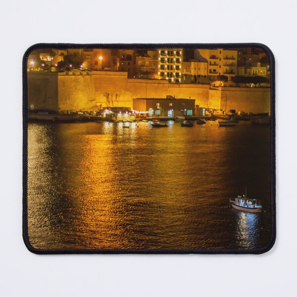 Item preview, Night Harbor With Small Boat and Historic Waterfront Fortress Illuminated by City Lights and Golden Reflections designed and sold by Nmallia.