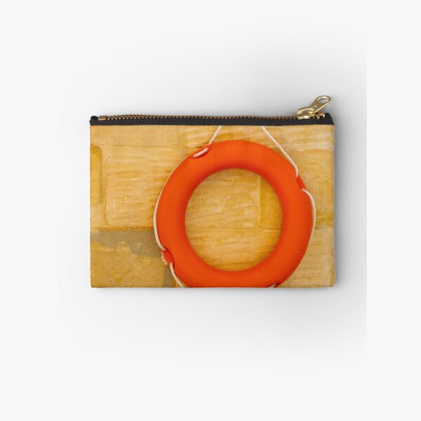 Item preview, Orange Lifebuoy Life Preserver Hanging On Stone Wall With Rope Nautical Safety Equipment For Rescue designed and sold by Nmallia.