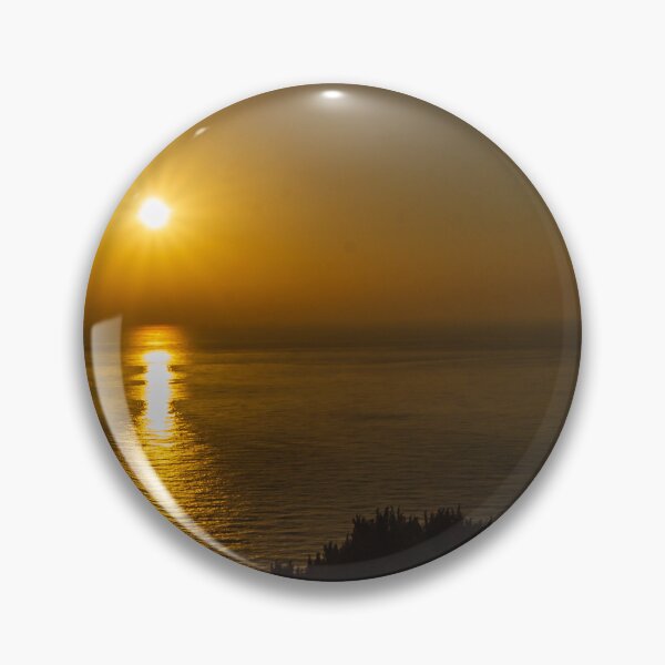 Item preview, Golden Sunset Over Calm Ocean With Sun Reflection on Water and Coastal Silhouette designed and sold by Nmallia.