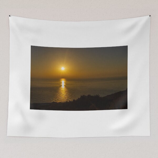 Item preview, Golden Sunset Over Calm Ocean With Sun Reflection on Water and Coastal Silhouette designed and sold by Nmallia.