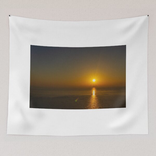 Item preview, Golden Sunset Over Calm Ocean With Sun Reflection on Water and Coastal Silhouette designed and sold by Nmallia.