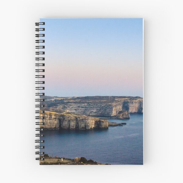 Item preview, Limestone Cliffs Along Rugged Coastline With Pastel Sky at Dusk Over Calm Sea designed and sold by Nmallia.