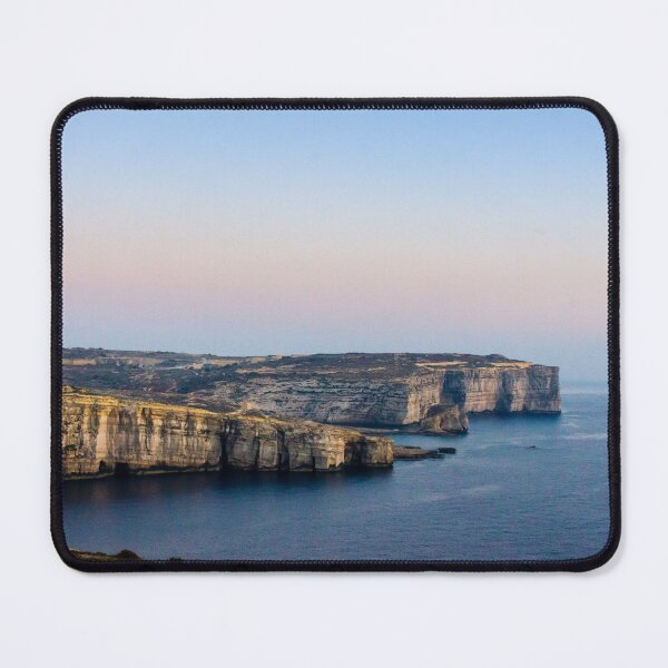 Item preview, Limestone Cliffs Along Rugged Coastline With Pastel Sky at Dusk Over Calm Sea designed and sold by Nmallia.