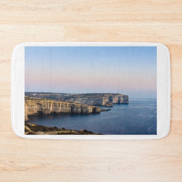 Item preview, Limestone Cliffs Along Rugged Coastline With Pastel Sky at Dusk Over Calm Sea designed and sold by Nmallia.