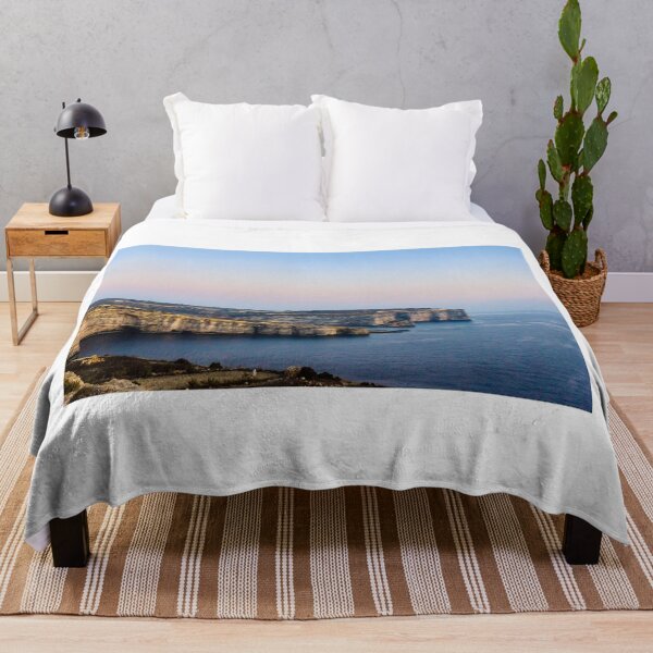 Item preview, Limestone Cliffs Along Rugged Coastline With Pastel Sky at Dusk Over Calm Sea designed and sold by Nmallia.