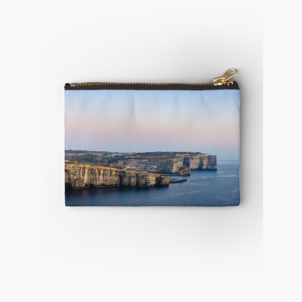 Item preview, Limestone Cliffs Along Rugged Coastline With Pastel Sky at Dusk Over Calm Sea designed and sold by Nmallia.