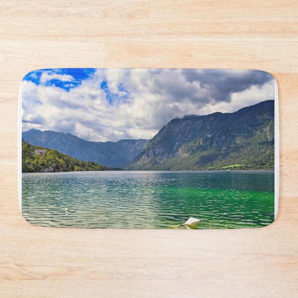 Item preview, Bohinj Lake in Slovenia. Landscape of the lake with green water and mountains in background designed and sold by goceris.