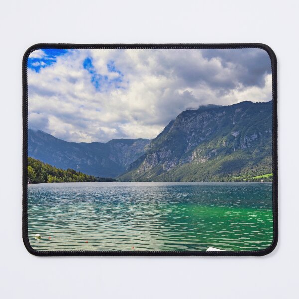 Item preview, Bohinj Lake in Slovenia. Landscape of the lake with green water and mountains in background designed and sold by goceris.
