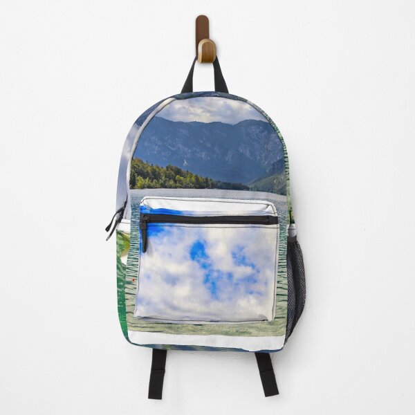 Item preview, Bohinj Lake in Slovenia. Landscape of the lake with green water and mountains in background designed and sold by goceris.