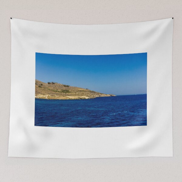 Item preview, Blue Sea and Rocky Coastline Under Clear Sky Overlooking a Quiet Coastal Landscape designed and sold by Nmallia.