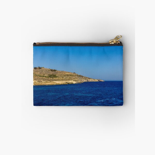 Item preview, Blue Sea and Rocky Coastline Under Clear Sky Overlooking a Quiet Coastal Landscape designed and sold by Nmallia.