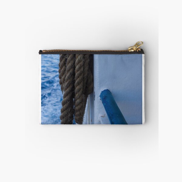 Item preview, Thick Mooring Rope Coiled on Ship Rail With Deep Blue Ocean Background, Nautical Maritime Detail designed and sold by Nmallia.