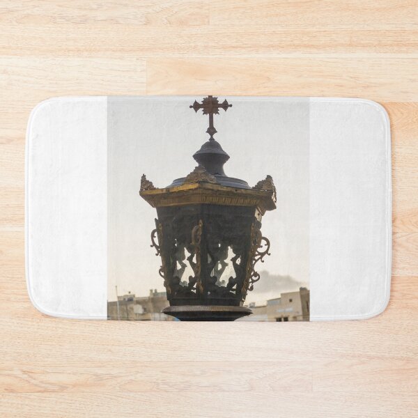 Item preview, Ornate Vintage Street Lantern With Cross Ornament Above An Old Cityscape designed and sold by Nmallia.
