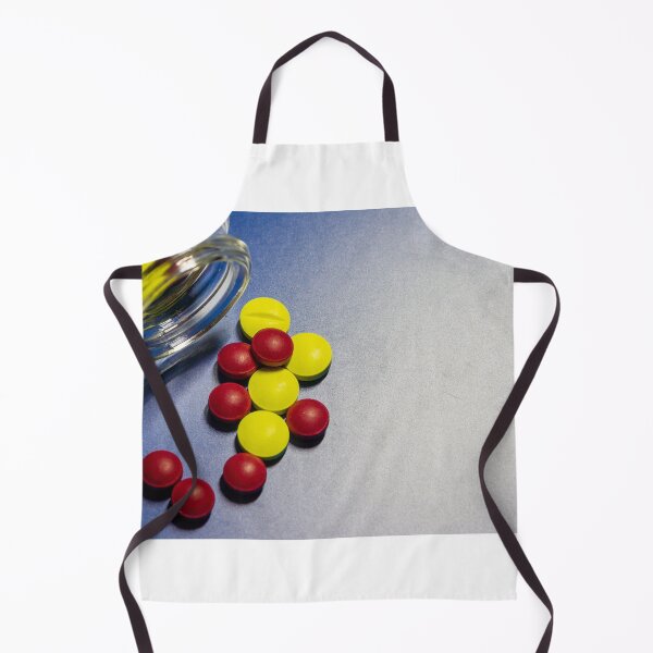 Item preview, Colorful Candy Tablets Spilling From Small Glass Jar On Blue Surface Background designed and sold by Nmallia.