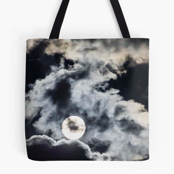 Item preview, Full Moon Behind Dramatic Clouds At Night With Moody Moonlight And Eerie Sky Atmosphere designed and sold by Nmallia.