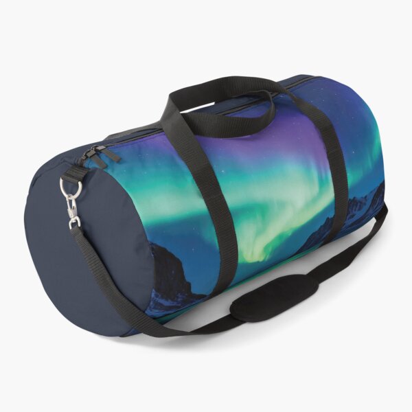 Item preview, Magical Green and Purple Aurora Borealis Reflection Over Snowy Mountains and Starry Night Sky designed and sold by Dezinix.