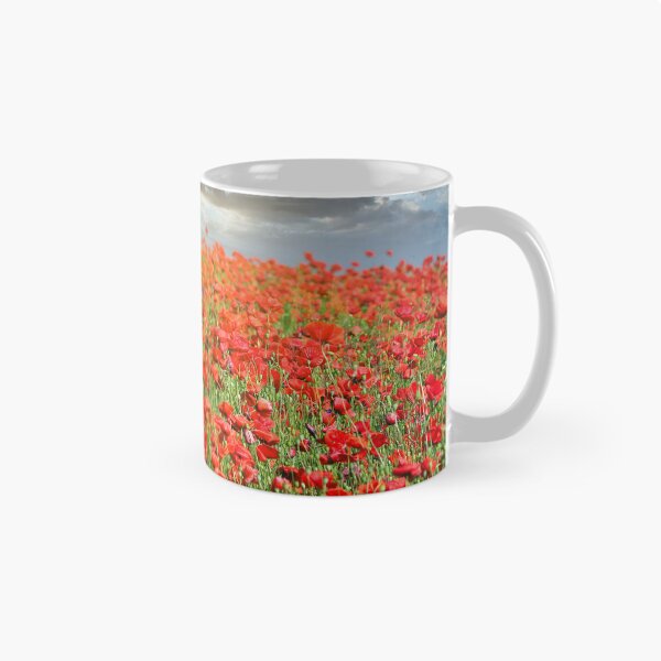 Item preview, The sun's rays break through the clouds and shine on the poppies flower meadow, spring season designed and sold by goceris.
