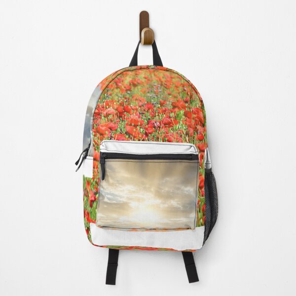 Item preview, The sun's rays break through the clouds and shine on the poppies flower meadow, spring season designed and sold by goceris.