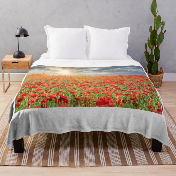 Item preview, The sun's rays break through the clouds and shine on the poppies flower meadow, spring season designed and sold by goceris.
