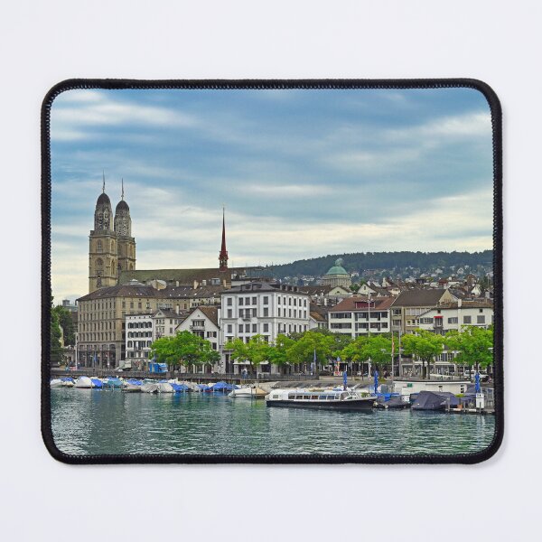 Item preview, Historic Zurich city center with famous Grossmunster churh and boats on the river Limmat designed and sold by goceris.