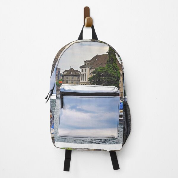 Item preview, Historic Zurich city center with famous Grossmunster churh and boats on the river Limmat, Switzerland designed and sold by goceris.