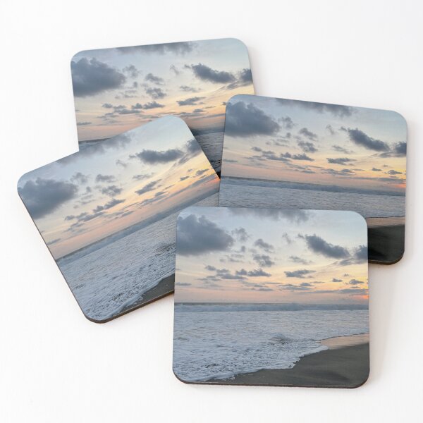 Item preview, Sunset on the surf-covered shore designed and sold by Art of Momenz.