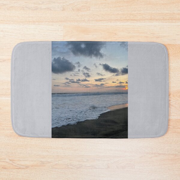 Item preview, Sunset on the surf-covered shore designed and sold by Art of Momenz.