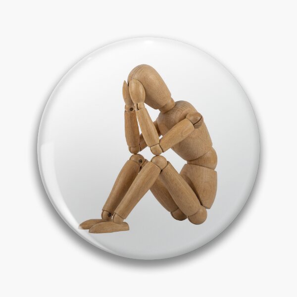 Item preview, sad wooden figure designed and sold by CornershopTee.