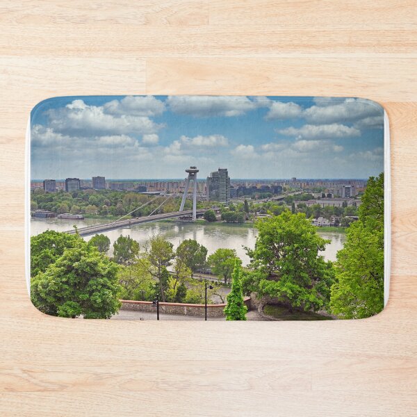 Item preview, Aerial view of the Bratislava cityscape with a famous UFO tower observation deck above SNP bridge over Danube river. Bratislava is a capital city of Slovakia. designed and sold by goceris.